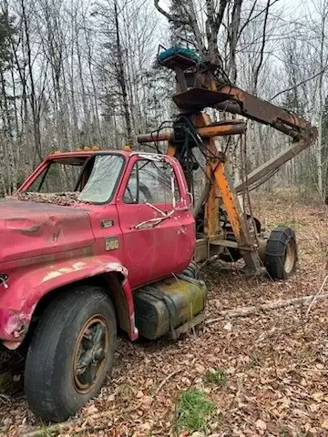Barko Log Loader on GMC truck (366 motor). Hasnt been started in a few years but everything is still...