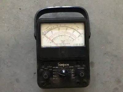 Offering a used Simpson 260 Volt-Ohm-Milliammeter, ideal for parts or repair. The batteries leaked ,...