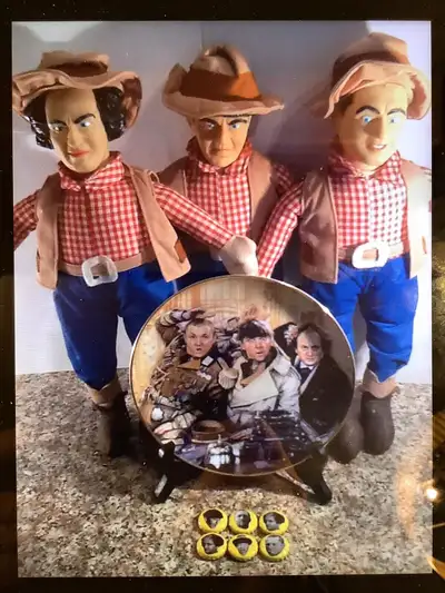 Collection of The 3 Stooges items. From 2001 is a set of The 3 Stooges 15 inch dolls dressed in thei...