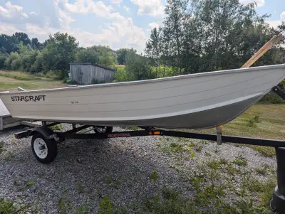 2001 9.9 Mercury Outboard Motor, with 2007 14 Foot StarCraft and 2008 Trailer come with gas tank and...