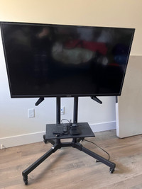 50 inch smart TV with protable stand