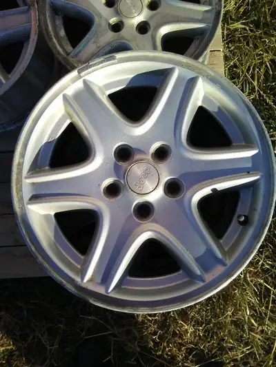 Four 16 x 7 six spoke Jeep aluminum rims