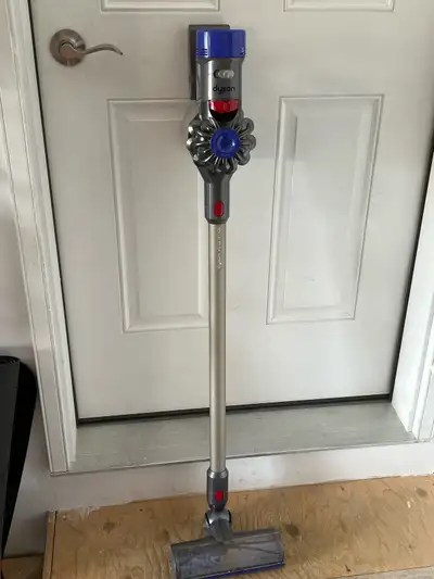Used Dyson V8 animal that works well on regular. Battery does not last as long on Max. Comes with ac...
