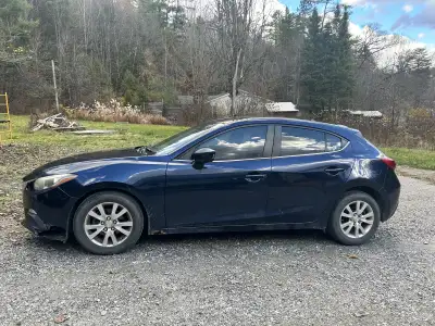 2014 Mazda 3 Sport GX 5 door automatic Damaged front bumper (cracked on a curb, lost a chunk in the...