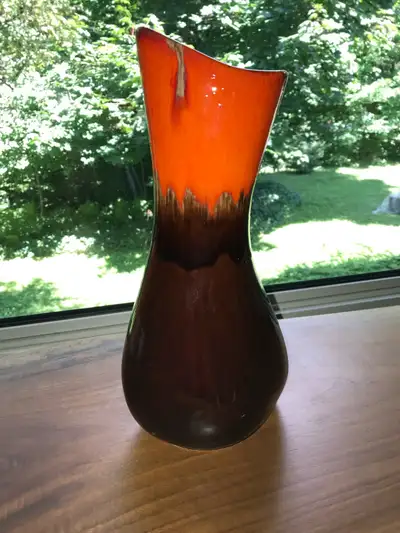 Add a retro touch to your decor with this striking MCM Fat Lava style vase, featuring a unique orang...