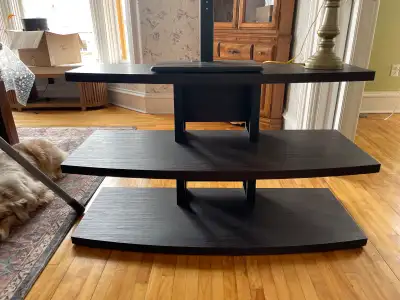 TV stand from Walmart, bery light and in good condition. A couple dents from moving. $35, to pick up...