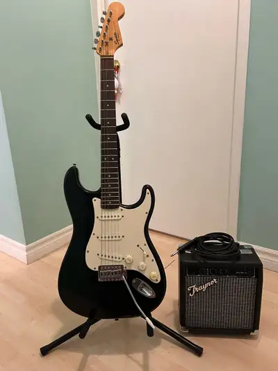 Squier Fender Electric Guitar and Amp, View more
