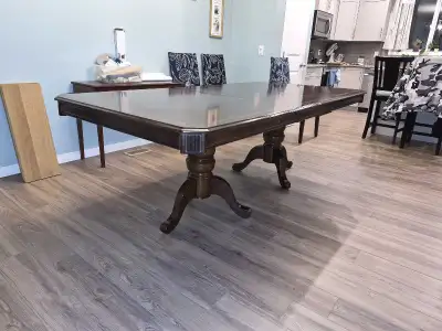 Dining table located in LEGACY. $200 OBO Originally from Ashley. 39"H x 42"W x 88"L when extended On...