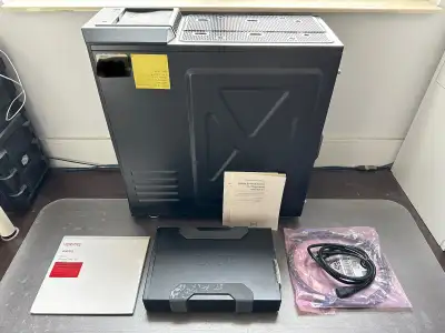I’m selling a complete archival tape backup system. This package includes the following: - External...