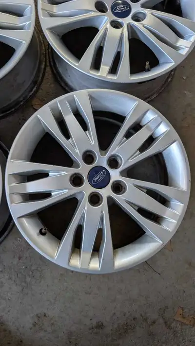 Selling a set of 4 Ford OEM rims that are 16 inches. They are in like new condition with only a few...