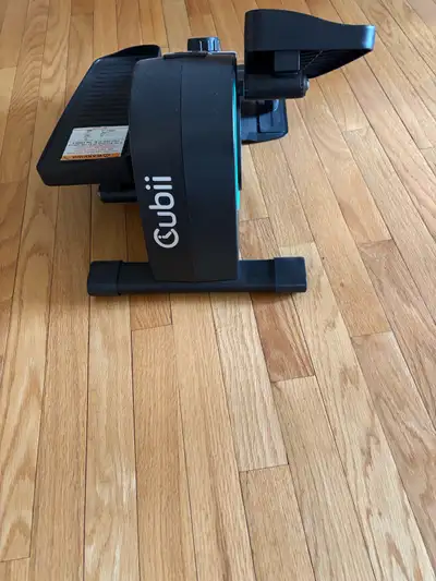 Get fit while you sit with this Cubii elliptical trainer! This compact and quiet machine is perfect...