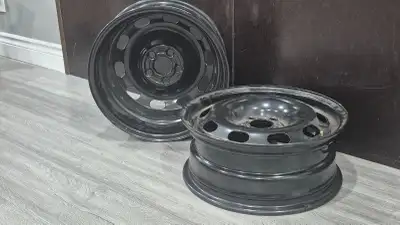 2 - 15" Brand New Steel Rams - Bolt Pattern 5X110 Never been on the road