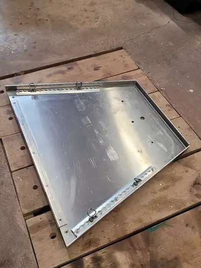 Custom trailer tongue storage tray. This was used to hold twin 20lb propane tanks and a generator on...