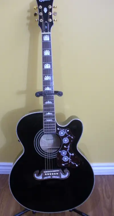 Epiphone EJ200 SCE Jumbo acoustic guitar. Looking to trade for an acoustic guitar with or without el...