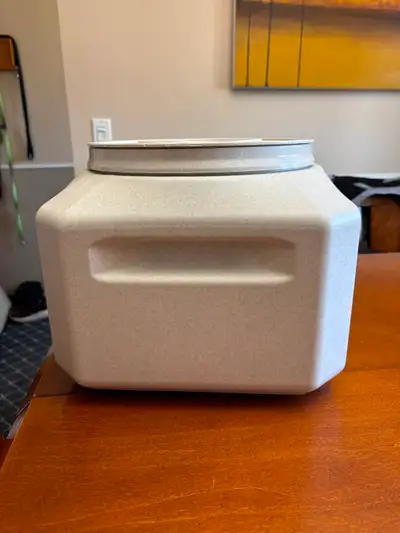 Used for cat food. Could also store bird seed or use for smaller dog. Dimensions are approximately 1...