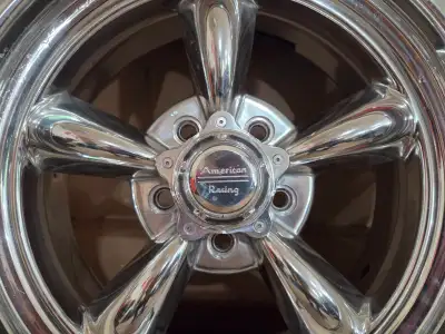 I am selling 2 brand new american racing torq thrust 2 wheels that did not work for my street rod, t...