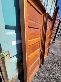 2 Solid wood interior doors with door frames $100 each