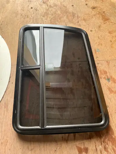This used van window measures 22 inches wide by 31 inches tall and is 3 inches deep, making it a sui...