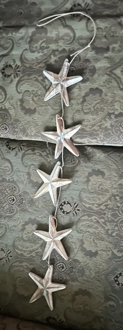 Starfish Garland hangs from ceiling, View more