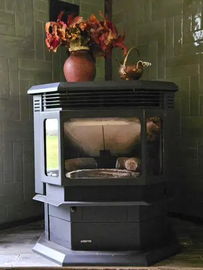 Quadra Fire Classic Bay 1200 pellet stove two years old Complete system. Stove, exhaust plumbing, th...