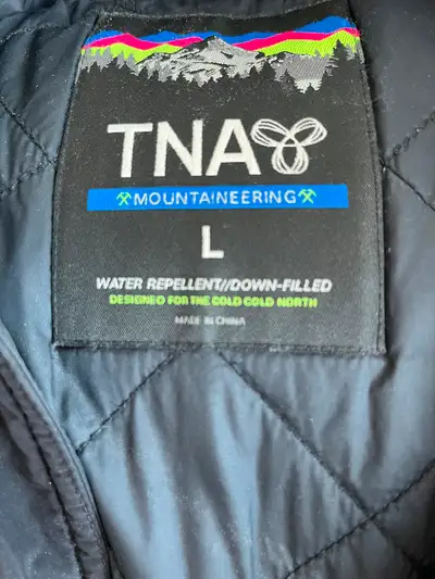 Down winter parka brand TNA. Bought in Aritzia for over $500, almost a years ago. Excellent and incr...