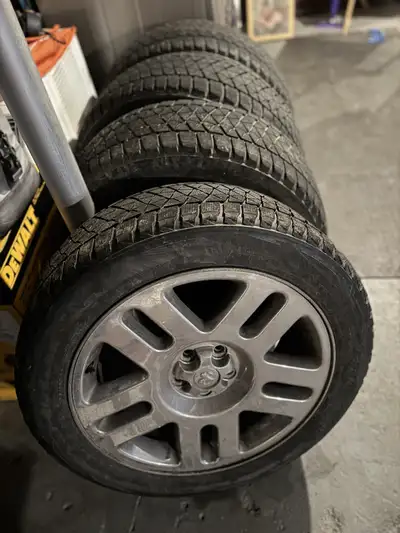 4 x 235/55R20 Bridgestone Blizzak DM-V2 235/55R20 102 T Winter tires - paid $1500 after taxes great...