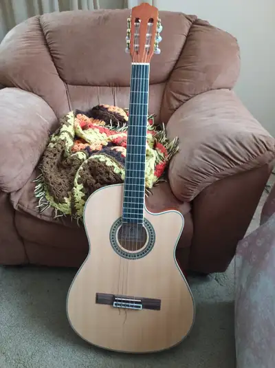 Thinline electric classical guitar - $160., View more