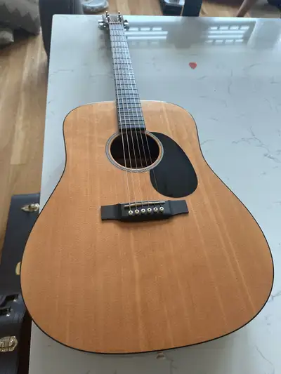 Selling my used Martin DRSGT acoustic guitar, which delivers a rich, resonant sound perfect for both...