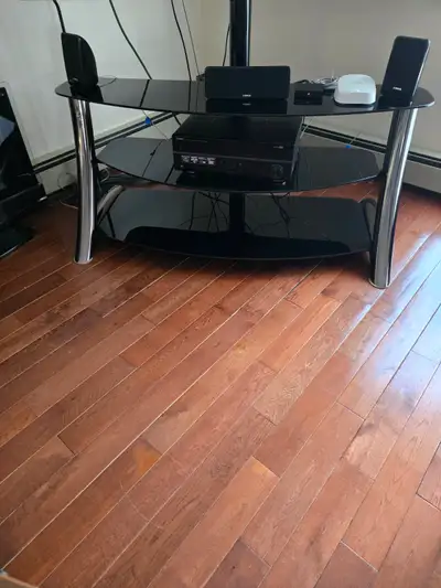 TV stand with 3 glass shelves can hold up to 65" TV in very good condition. Asking $110.00