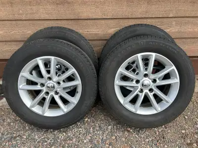 Tires purchased new in 2025 (only one summer of use). Rims and tires come of a Dodge Carivan. We sol...