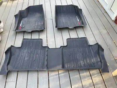 Selling Set of floor mats from 2017 GMC Acadia Denali. Semi new, paid over $350 used couple years. S...