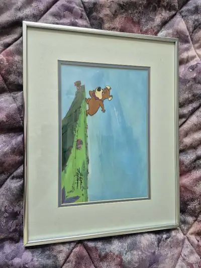 Bring a touch of nostalgia to your space with this charming, framed Yogi Bear animation cel, a delig...
