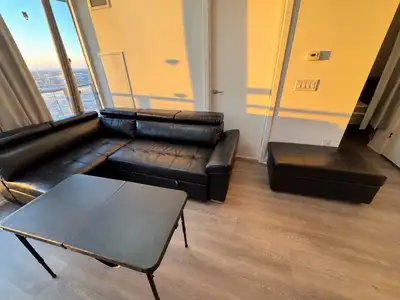 Black Leather Sectional Sofa along with the table, View more