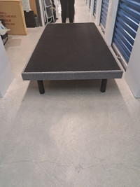 New grey platform for a single bed
