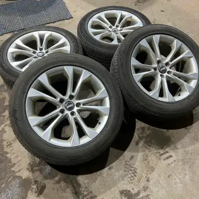 Set of 4 aftermarket aluminum alloy rims with 235/55R19 Continental Cross Contact LX Sport all seaso...