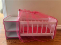 White and pink doll crib