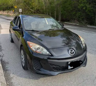Selling my 2012 Mazda 3 Sedan Reliable and fuel-efficient Mazda 3 with a sleek black exterior. This...