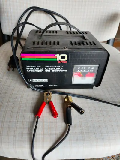 chargeur de batterie d'auto. 506 735 7825