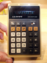Calculatrice vintage LLOYD'S Accumatic 321