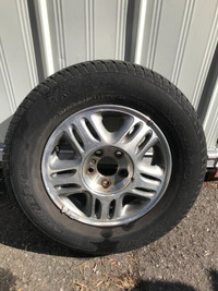 4 Chevrolet 15 inch 215/70/R15 summer tires on Aluminum Rims.