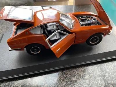 $12!!!Maisto  1971  Datsun   1/18  scale, View more
