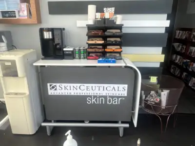 display stand used in spa and medical spa. The sticker "SkinCeuticals" Is covering the word "Dermalo...