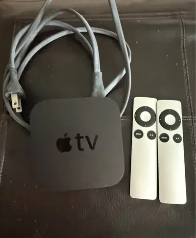AppleTV box and remotes, View more