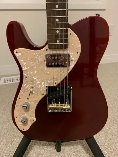 A Custom made left handed Telecaster in the style of the Fender Thinline Telecasters of the 1970's....
