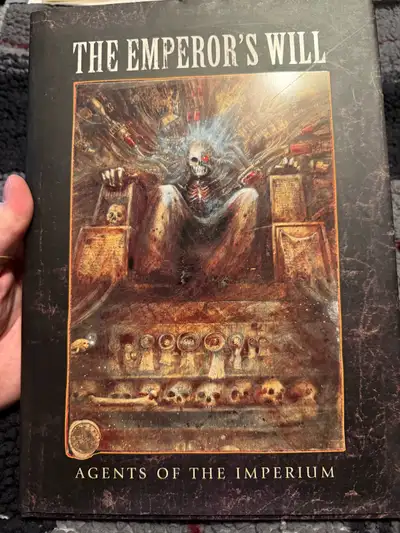 I have a Hardcover copy of The Emperor’s Will - Agents of the Imperium. A Warhammer 40,000 Art Book,...