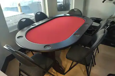 High quality poker table with felt padded top with seating for 8. Chairs not included but available...
