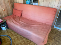 Red IKEA futon