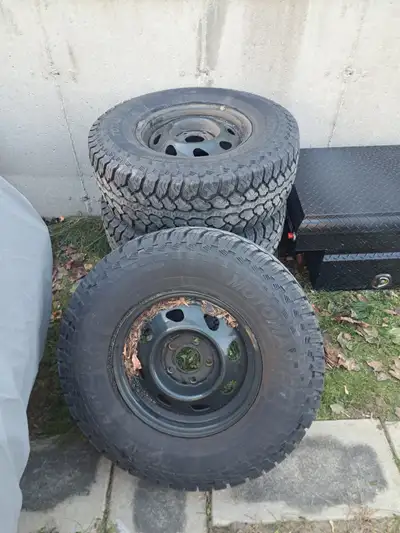 Set of 4 31x10 5x15 motomaster total terrain on a set of 4wd gmc jimmy/chevrolet blazer rims. Rims i...