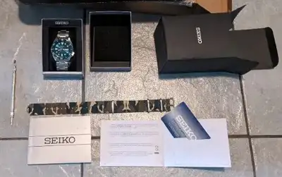 Everything is brand new, Automatic Seiko 42mm green diver watch with open case back on bracelet, com...