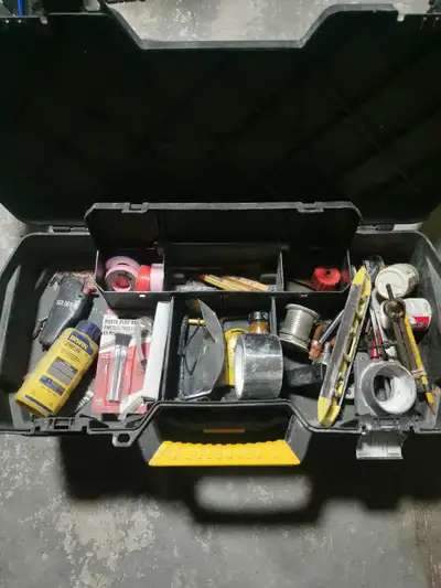 This is a durable, pre-owned DeWalt toolbox that includes a variety of assorted tools and supplies a...